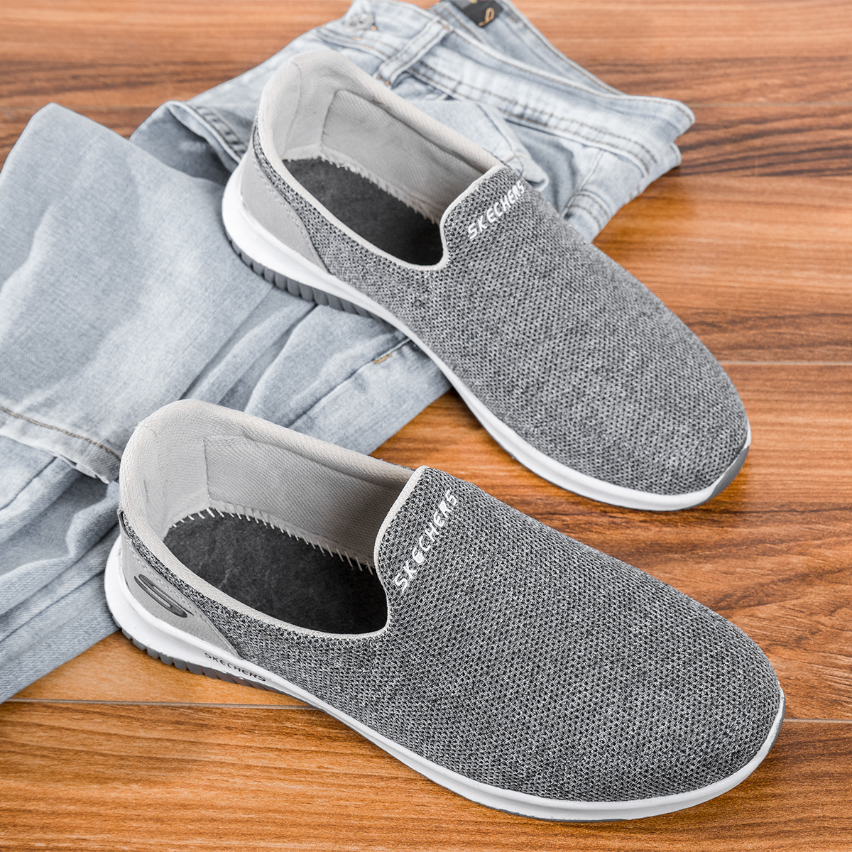 کفش ورزشی اسکیچرز مردانه طوسی مدل Tarok