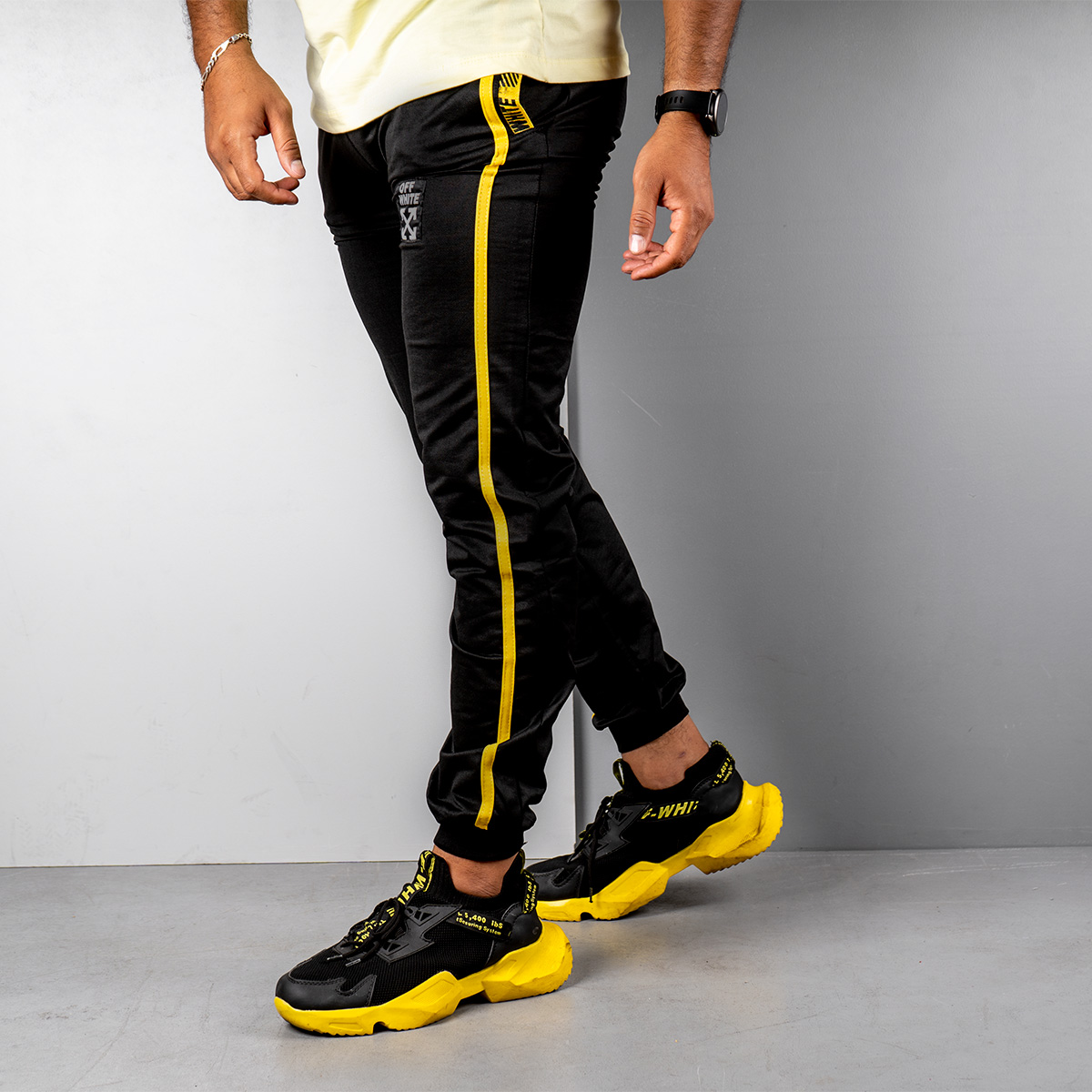 شلوار اسلش مردانه مشکی زرد مدل P62(T)