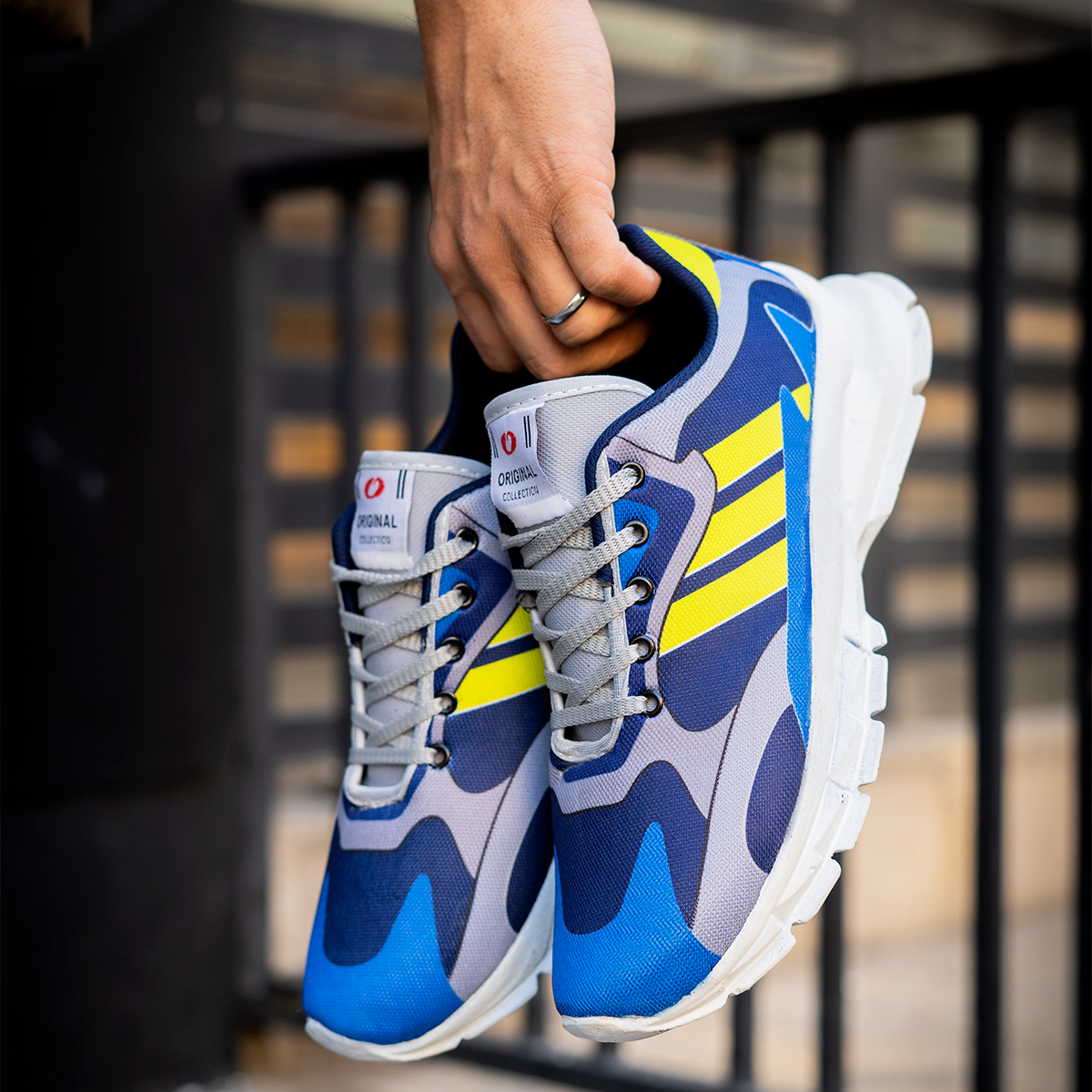کفش ورزشی Adidas مردانه زرد آبی مدل Tacha