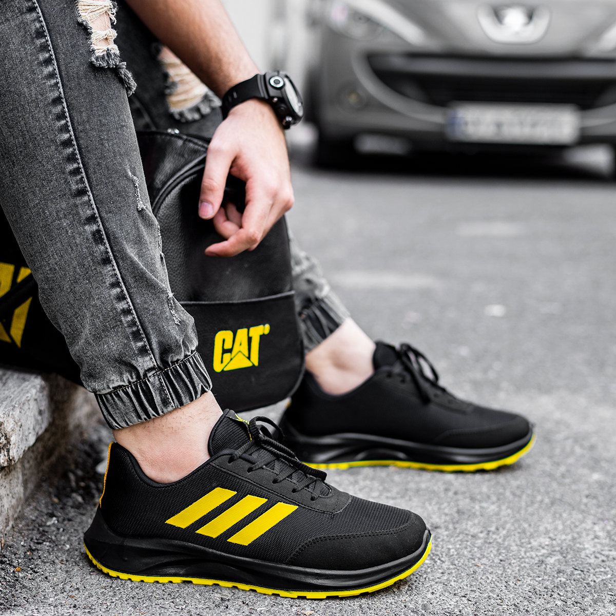 کفش ورزشی آدیداس مشکی زرد مردانه مدل Silva