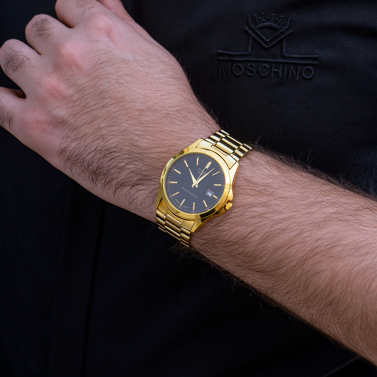 ساعت عقربه ای طلایی صفحه مشکی Casio مدل Edmon