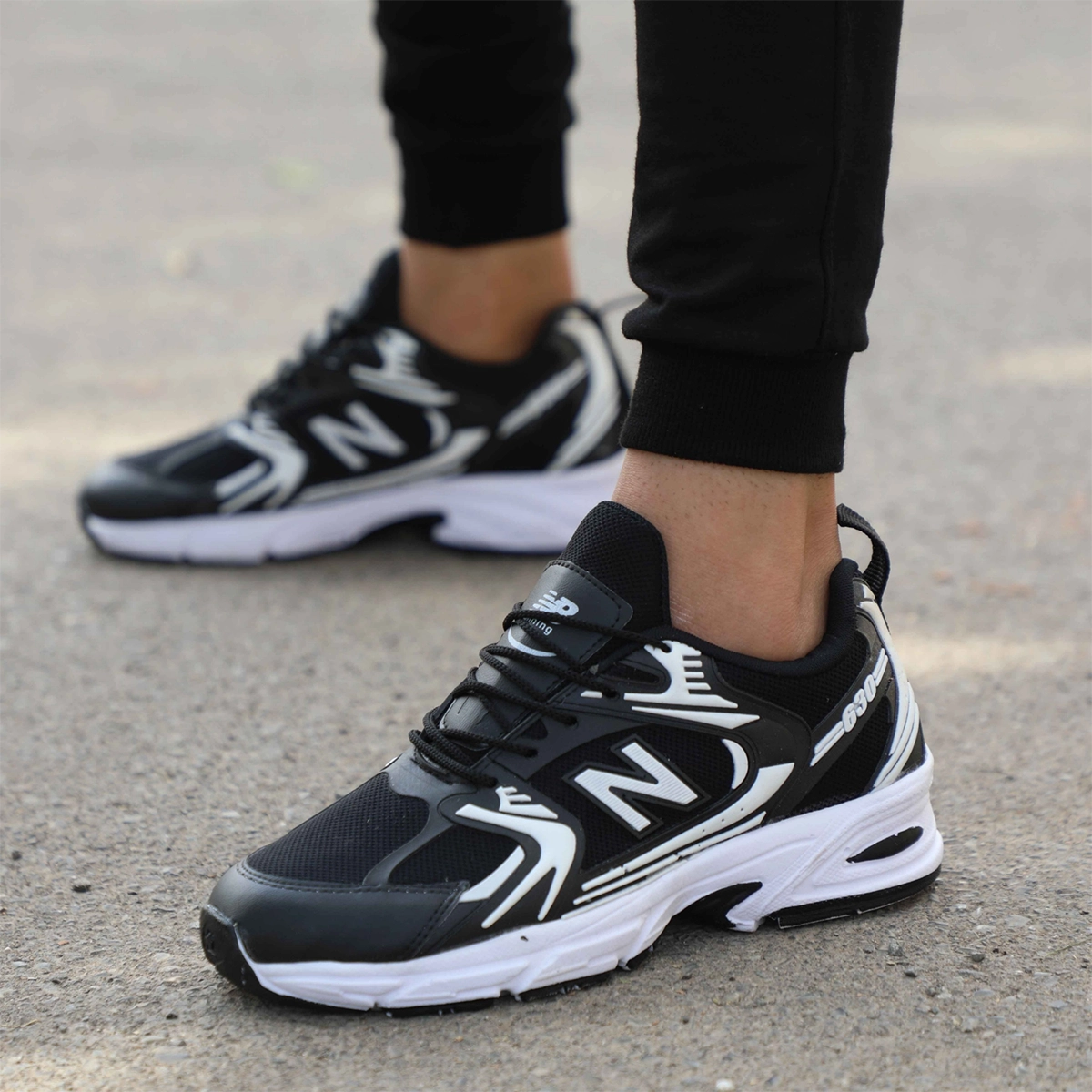 کفش ورزشی مردانه نیوبالانس مشکی مدل TAKO