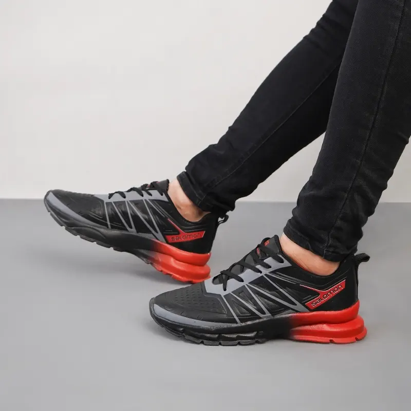 کفش ورزشی مردانه مشکی نارنجی مدل simba