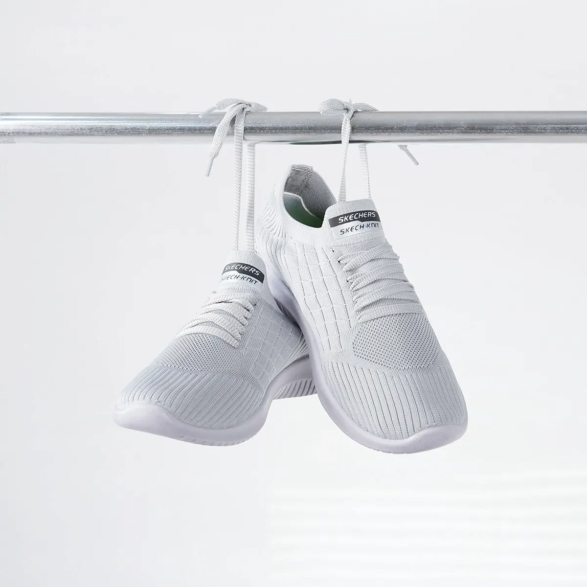 کفش ورزشی اسکیچرز مردانه طوسی مدلE55